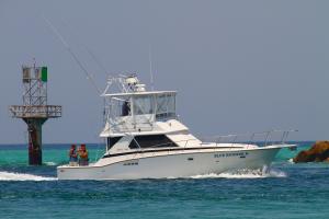 Click to enlarge image  - The Blue Runner II Coming in to harbor - June 30, 2011